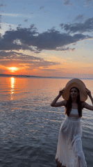 Wading at sunset on a glowing Russian waterfront
