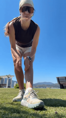 Woman dances in Fethiye park with Minnie Mouse pinwheel