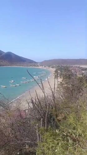 Tourist captures scenic coastal views of Juan Griego bay