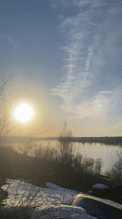Calm lake scene captured on sunny spring day in Russia