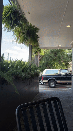 Evening documentation of residential Austin location includes patio, building exterior