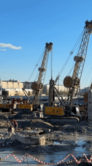 Construction crews operate drilling rigs in Saint Petersburg