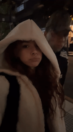 Woman in white hooded jacket observed in Buenos Aires