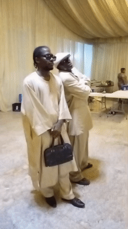 Inside a draped event hall in Bukuru, Nigeria