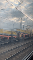 Train passenger documents journey, fellow travelers, passing work train