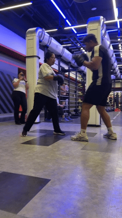 Boxing class in session at a Nong Pa Khrang gym