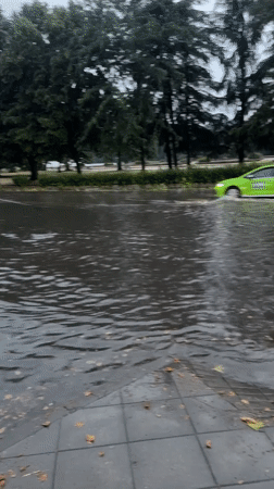 Flooded street in Plovdiv during daytime rainfall