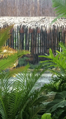 Visitor documents tropical café with waterfalls in Đà Nẵng