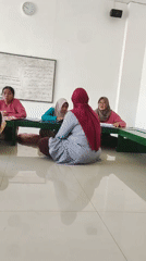 Routine child health checks at a community session in Mojopuro