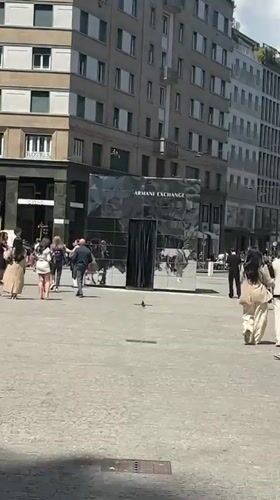 Armani Exchange mirrored installation observed in Milan public square