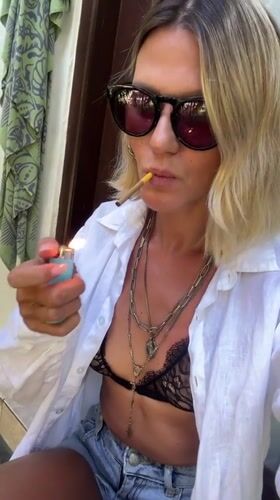 Morning cigarette break in North Kuta, Bali