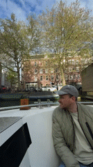 Leisurely canal boat tour documented across Amsterdam waterways
