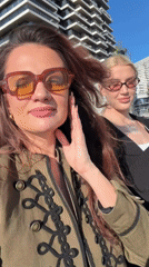 Casual moments captured around modern Belgrade building Saturday afternoon
