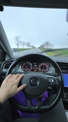 Driver travels rural road near Troyanovo, Bulgaria
