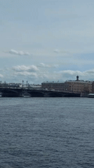 Tourist documents Saint Petersburg landmarks during morning walkabout