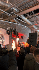 Band performs outdoors in Moscow amid blooming spring trees
