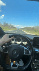 Driver travels highway in Mercedes near Pesnopoy, Bulgaria