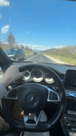 Driver travels highway in Mercedes near Pesnopoy, Bulgaria