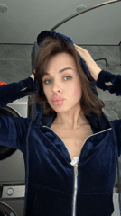 Woman takes playful bathroom selfies in Russian village
