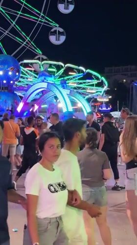 Nesebar amusement park lights up on a summer evening
