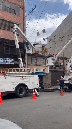 Utility crews maintain power lines in La Paz
