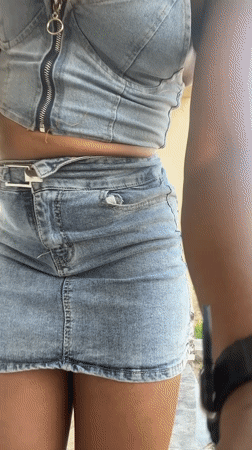 Woman takes selfies, poses outdoors in Jalingo, Nigeria