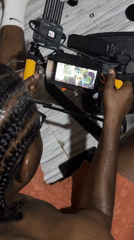 Film crew documents production and meal in Dome, Ghana