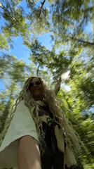Woman filmed walking through forest in Rusanovo, Russia