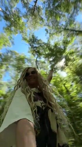 Woman filmed walking through forest in Rusanovo, Russia