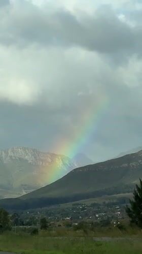 Rainbow observed over Stellenbosch mountains and town