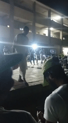 Nighttime outdoor performance draws crowd in Maiduguri, Nigeria