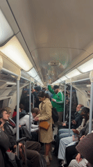 Crowded London Underground train observed during afternoon hours