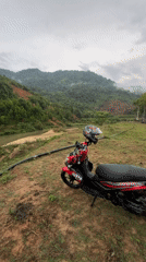 Motorcycle rest stop captured along river in Vietnamese countryside