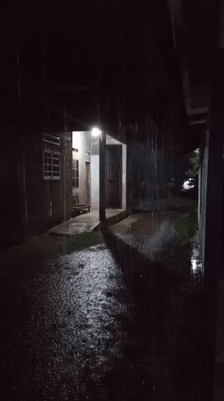 Heavy rainstorm documented in Lhokseumawe, Indonesia during afternoon hours