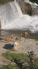 Waterfall scene with scattered furniture observed in Blagoevgrad, Bulgaria