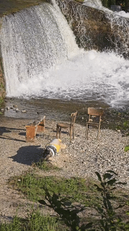 Waterfall scene with scattered furniture observed in Blagoevgrad, Bulgaria