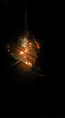 Welding work documented in dark setting in Adankolo, Nigeria