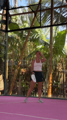 Woman plays padel on pink court in General Luna
