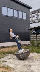Unicycle balancing act on a concrete-filled metal basin, Russia