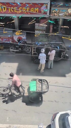 Morning street activity and passport processing documented in Amritsar