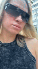 Woman records selfie video on street in Perm, Russia