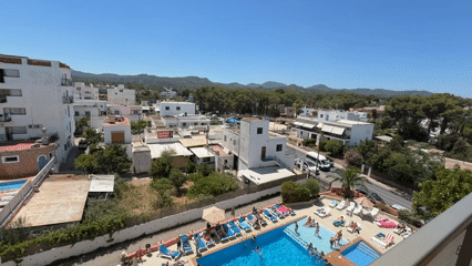 Sunny midday at a Sant Antoni resort, inside and out