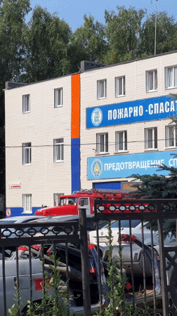 Street scenes around Izhevsk: trams, construction, and a fire station