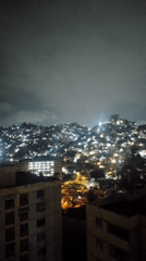 Nighttime views of Caracas captured from multiple elevated vantage points
