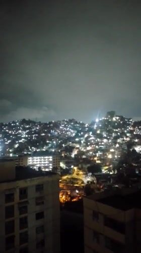 Nighttime views of Caracas captured from multiple elevated vantage points