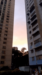 Evening life captured around Caracas apartment buildings and streets