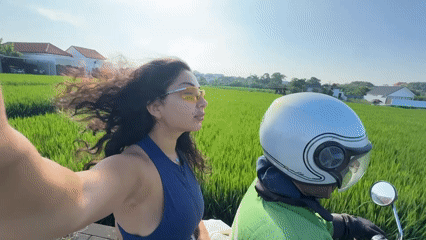Motorcycle selfie and rice fields captured in North Kuta