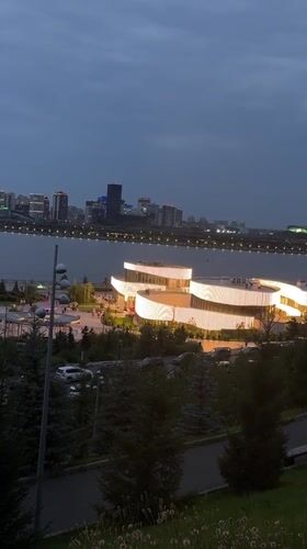 Kazan's Kazanka riverfront at dusk, park and skyline