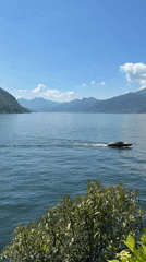 Tourists capture scenic Lake Como views in Varenna
