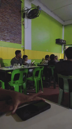 Crowd gathers to watch FIFA World Cup 2026 match on TV